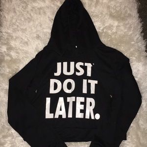 Funny slightly cropped Nike spoof sweater
